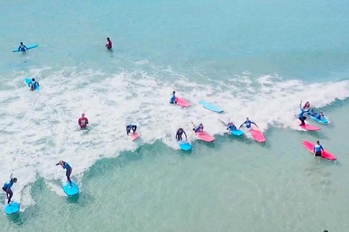 a group of people on a beach