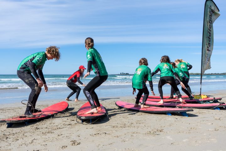 a group of people on a beach