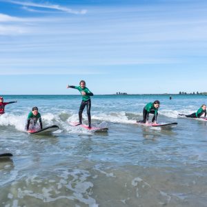 a group of people on a boat in the water